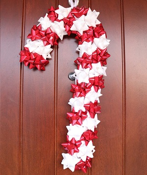 diy candy cane wreath with christmas bows