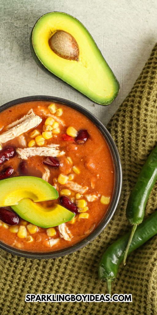 easy creamy crockpot chicken enchilada soup recipe for weeknight dinners