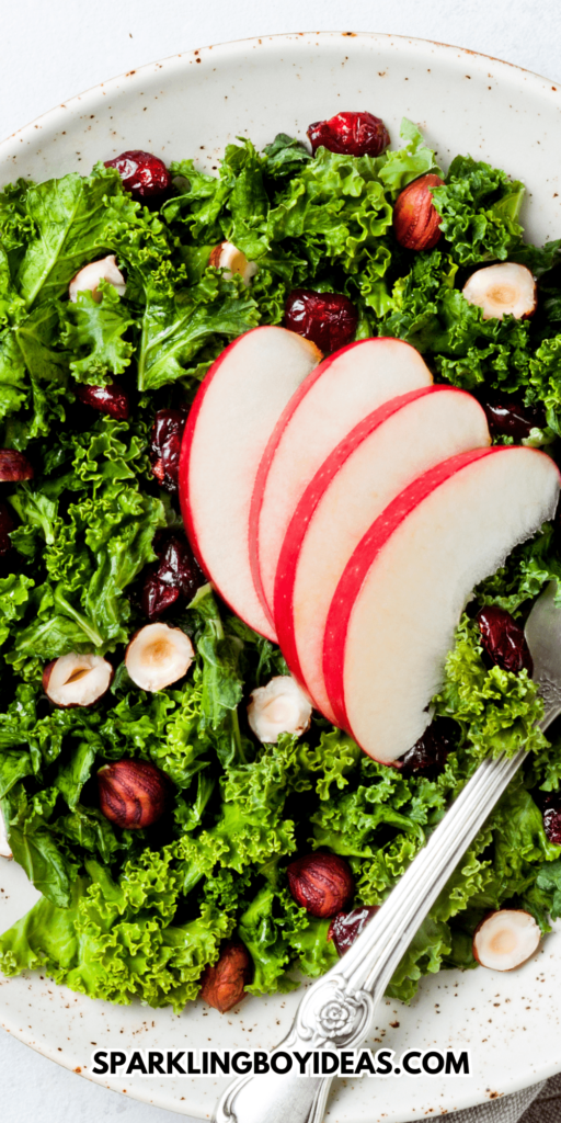 Kale salad with dried cranberry, hazelnuts and sliced apple