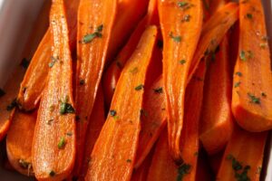 easy oven roasted honey glazed carrots are perfect Thanksgiving and Christmas side dish recipe