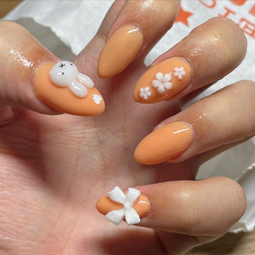 Charming bunny nail art in 'funny bunny' and 'bubble bath' shades, perfect for Easter nails.