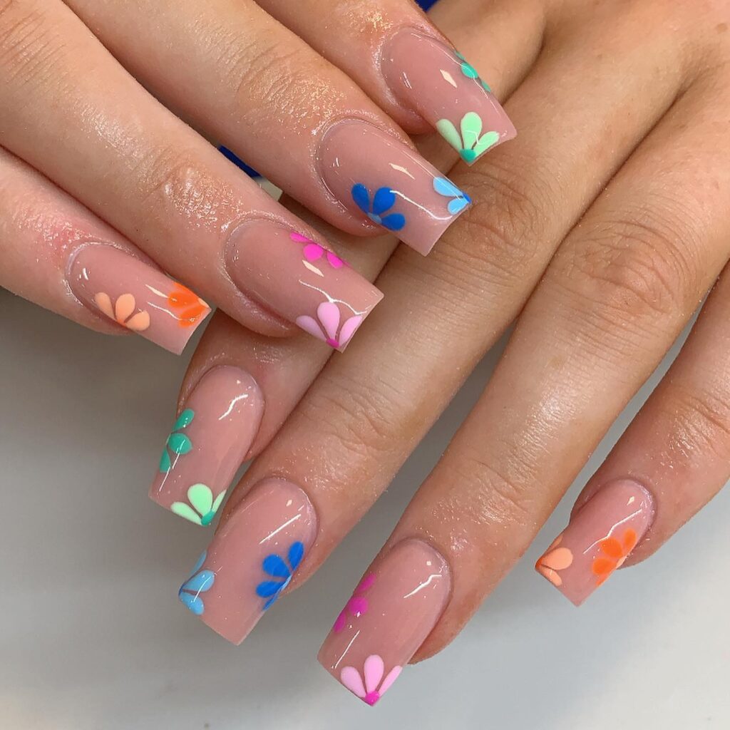 A collection of pastel nails in shades of pastel pink, pastel blue, and pastel green, showcasing spring pastel nails and cute nail designs