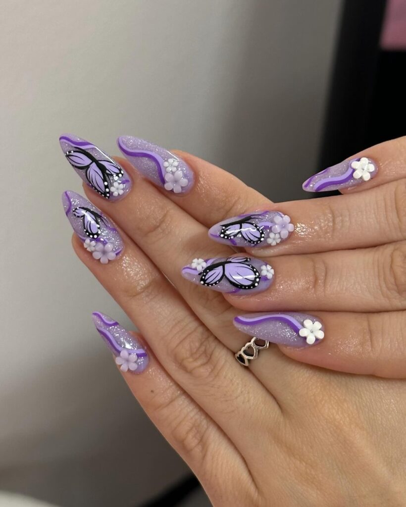 A stunning collection of purple nails in various shades from light purple to dark purple, showcasing elegant designs and polishes.