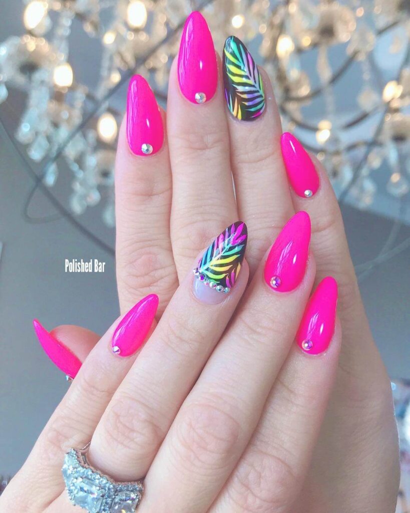 Variety of summer pink nail polishes and designs, including hot pink, neon, and light pink shades, perfect for trendy summer manicures.