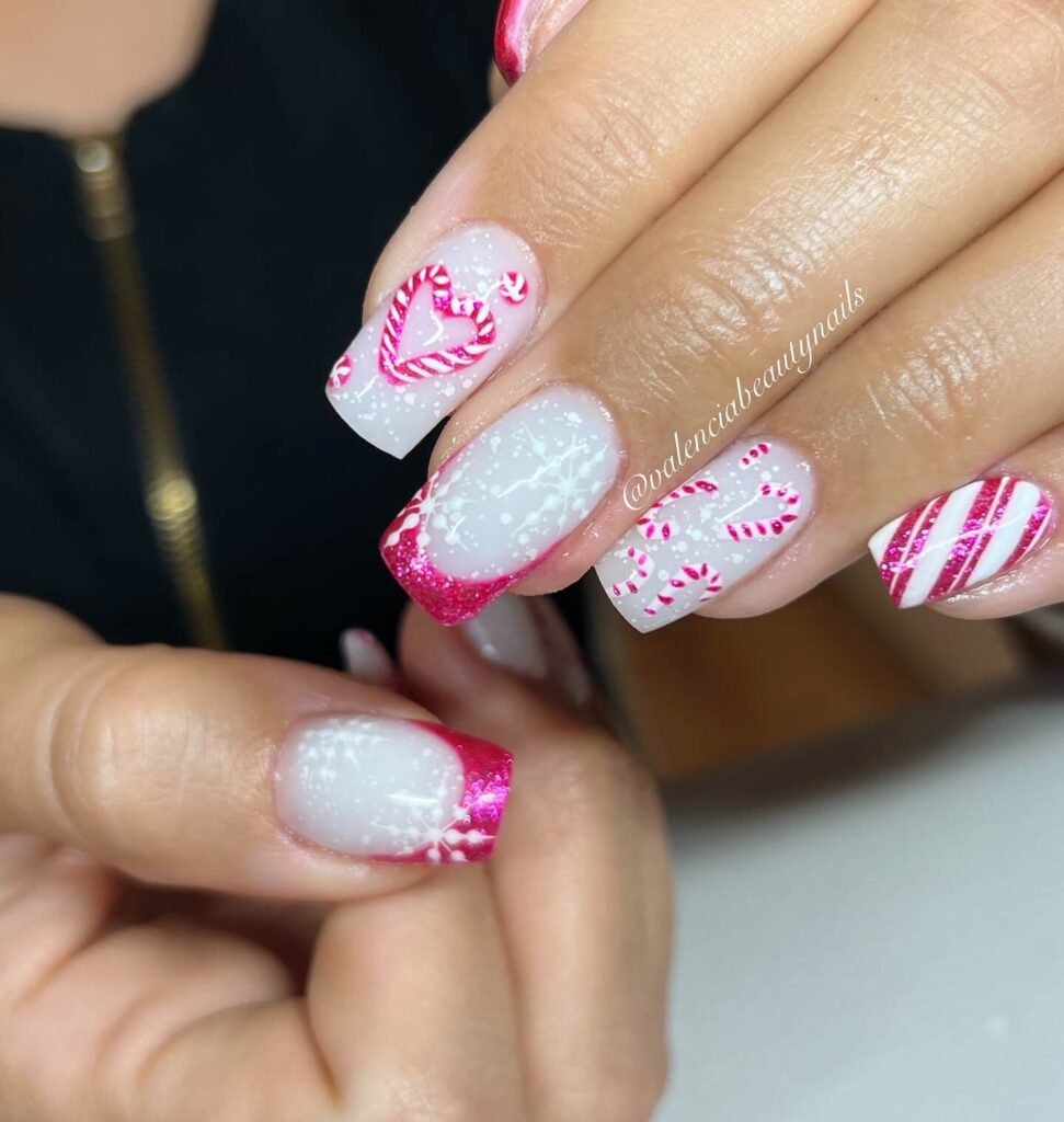 Close-up of candy nails featuring candy cane designs, lollipop nails, and candy corn nails with vibrant colors and intricate patterns.