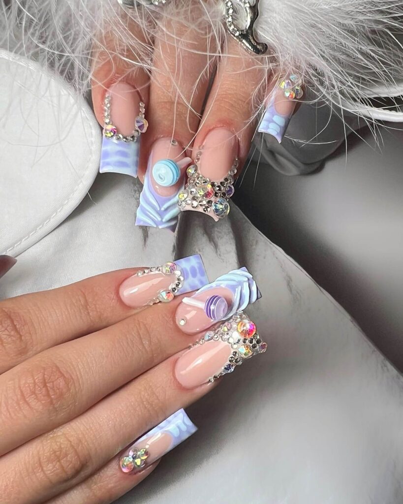 Close-up of candy nails featuring candy cane designs, lollipop nails, and candy corn nails with vibrant colors and intricate patterns.