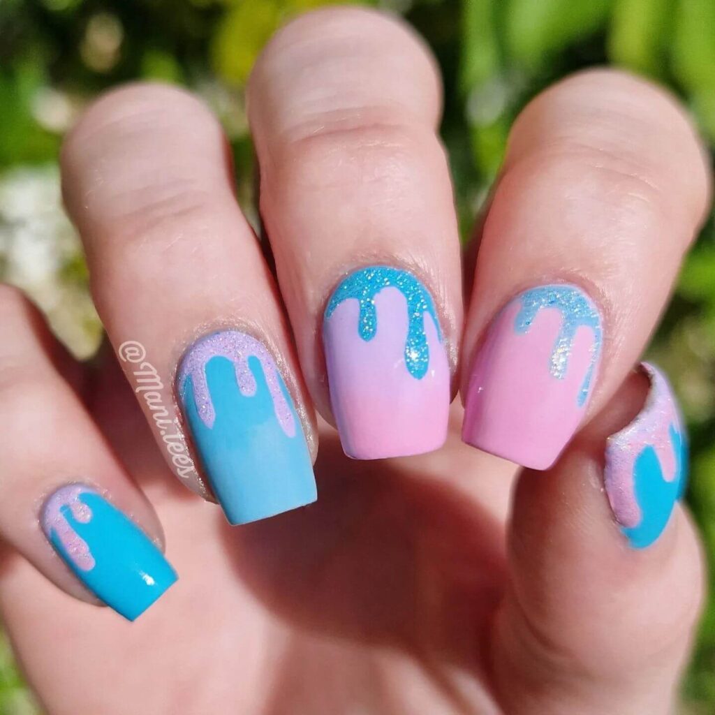 Close-up of candy nails featuring candy cane designs, lollipop nails, and candy corn nails with vibrant colors and intricate patterns.