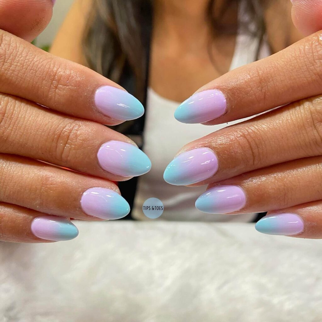 Close-up of candy nails featuring candy cane designs, lollipop nails, and candy corn nails with vibrant colors and intricate patterns.