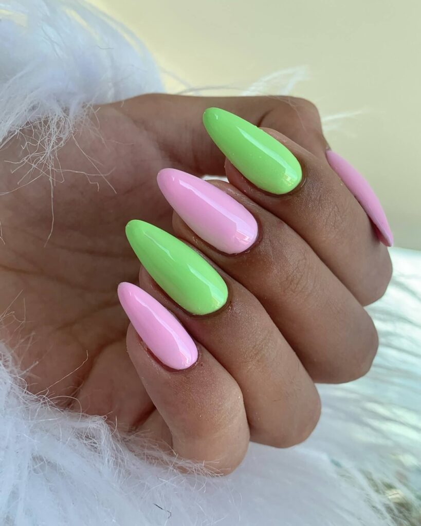 Close-up of candy nails featuring candy cane designs, lollipop nails, and candy corn nails with vibrant colors and intricate patterns.