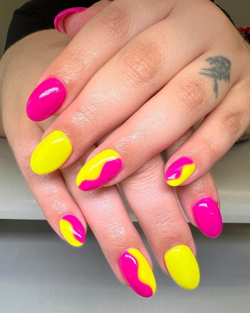 Bright and vibrant neon summer nails with trendy summer nail designs.