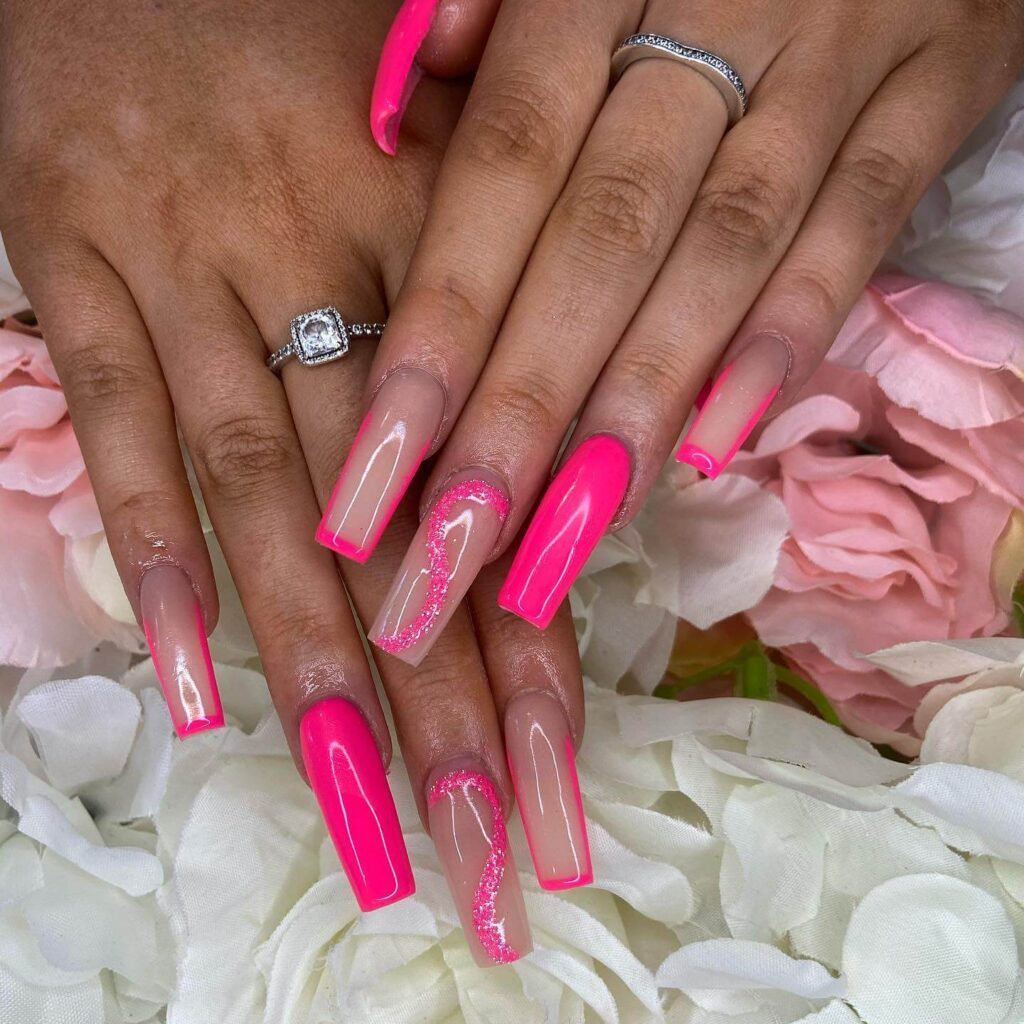 A variety of neon pink nails designs including neon pink and purple ombre nails, neon animal print nails, and neon matte nail designs.