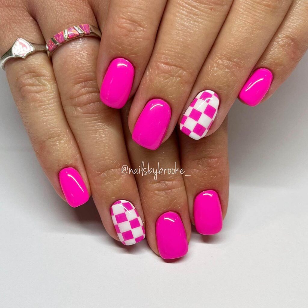 A variety of neon pink nails designs including neon pink and purple ombre nails, neon animal print nails, and neon matte nail designs.