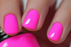 A variety of neon pink nails designs including neon pink and purple ombre nails, neon animal print nails, and neon matte nail designs.
