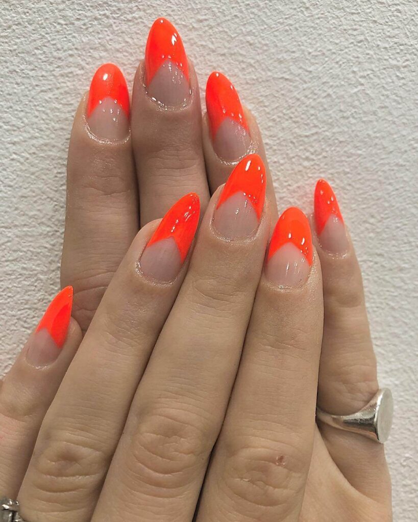 Bright and vibrant neon summer nails with trendy summer nail designs.