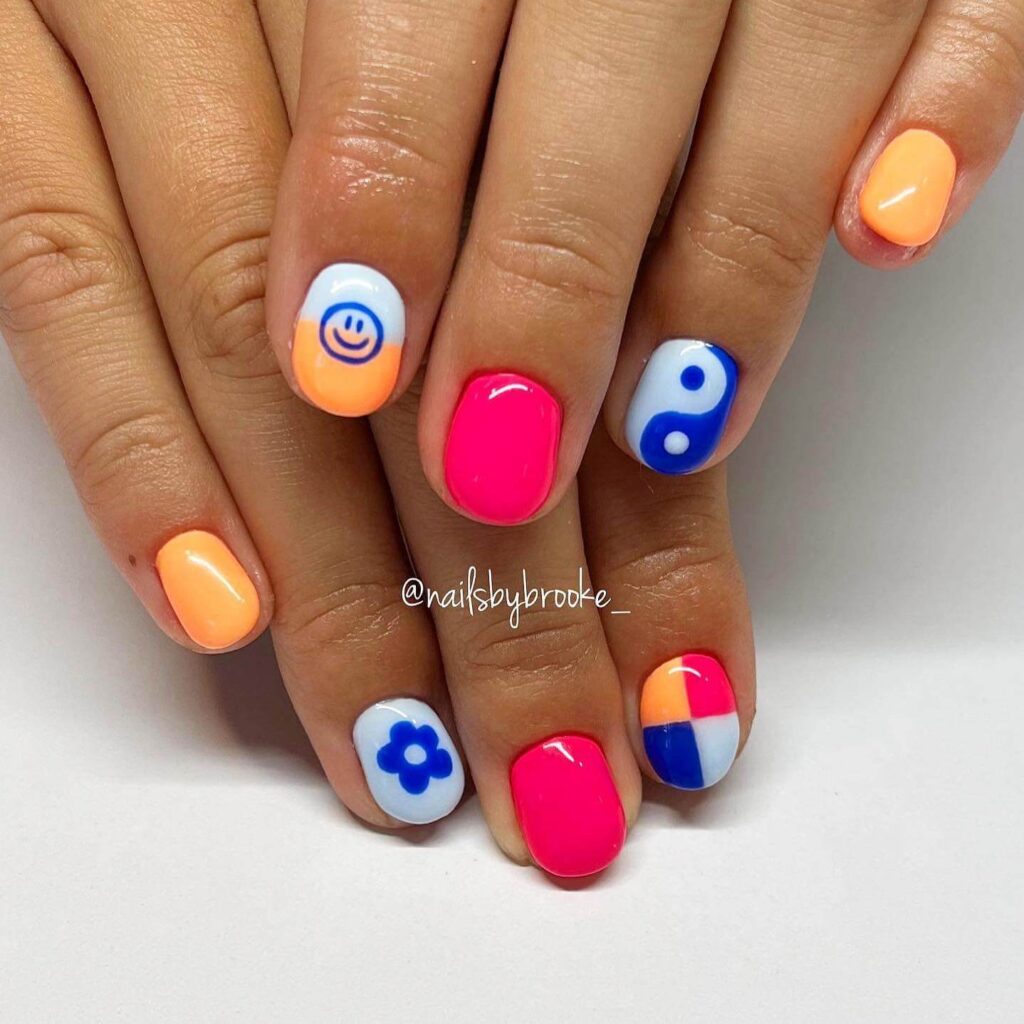 Bright and vibrant neon summer nails with trendy summer nail designs.