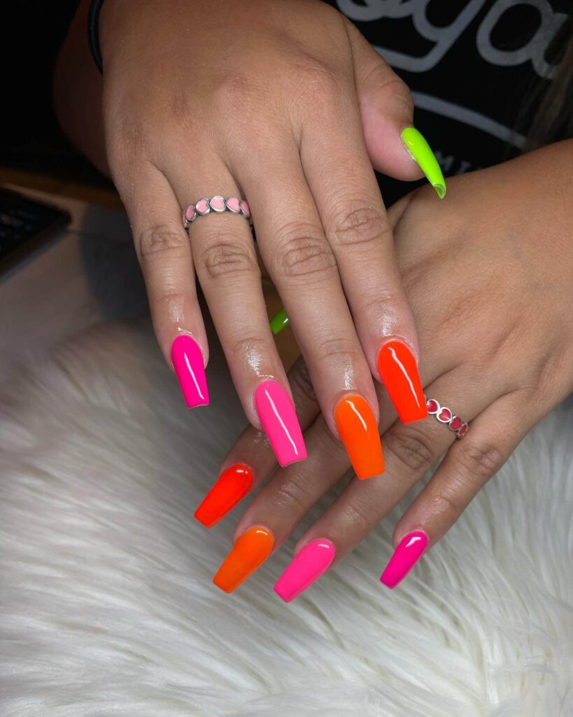 Bright and vibrant neon summer nails with trendy summer nail designs.