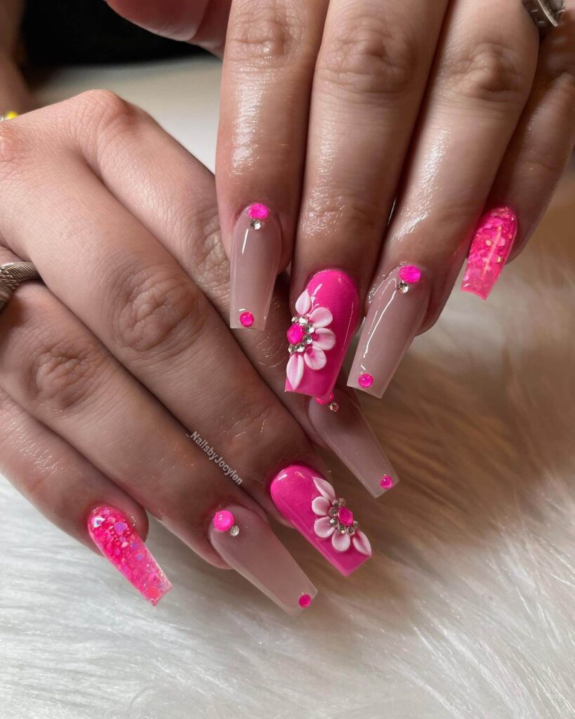 Various pink nail designs including bright pink nail designs, cute pink nail designs, and Christmas nails in pink with intricate patterns and decorations.