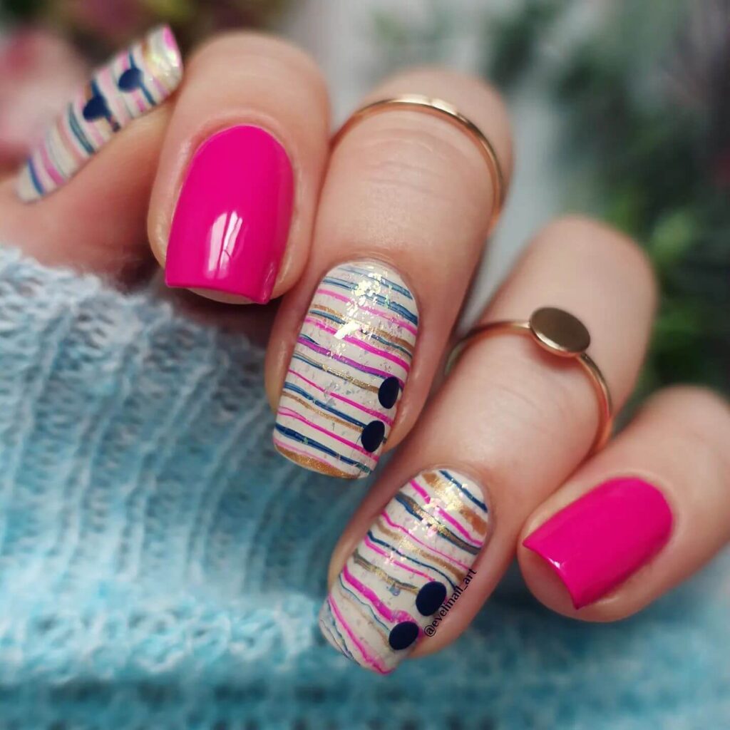 Various pink nail designs including bright pink nail designs, cute pink nail designs, and Christmas nails in pink with intricate patterns and decorations.