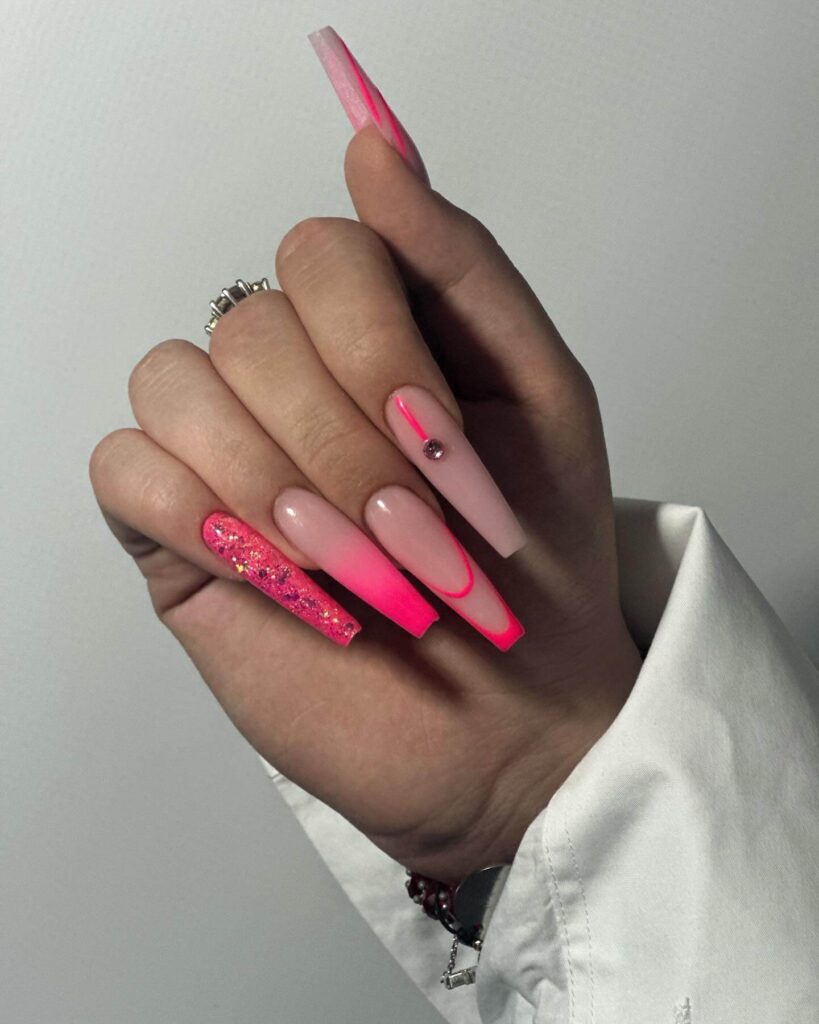 Various pink nail designs including bright pink nail designs, cute pink nail designs, and Christmas nails in pink with intricate patterns and decorations.