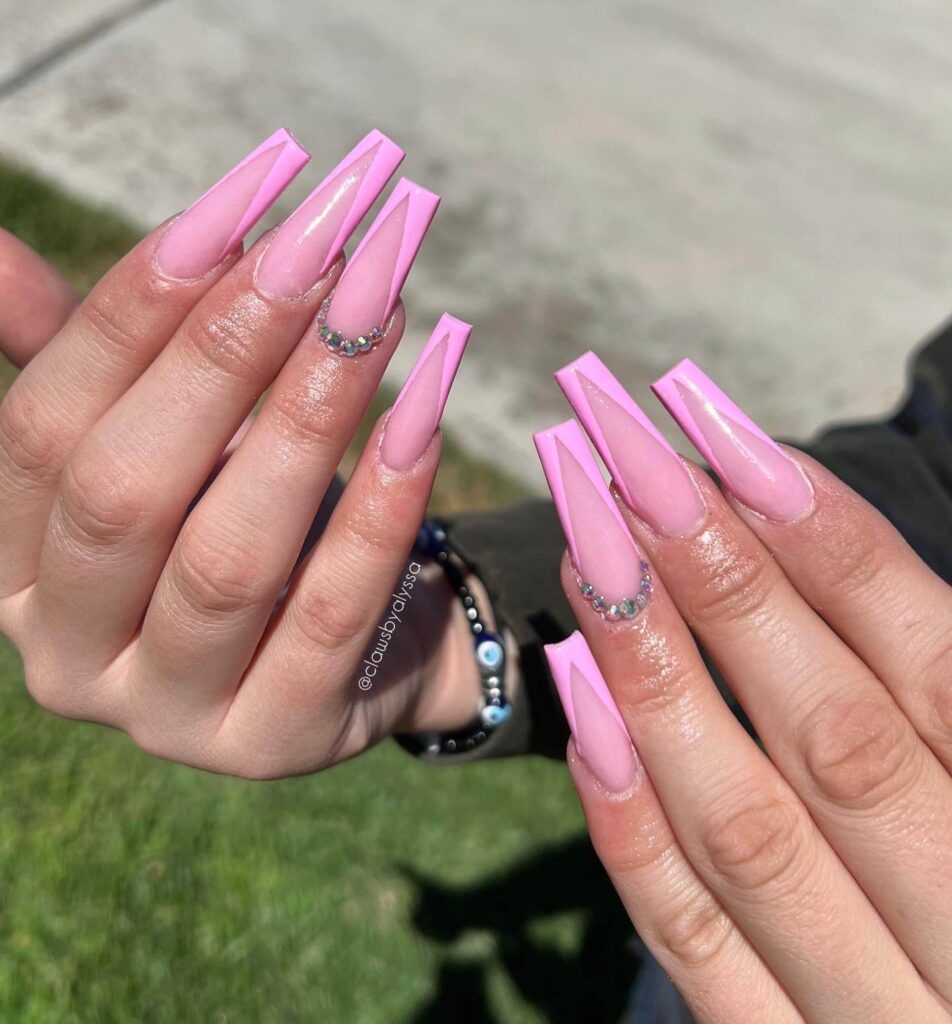 Various pink nail designs including bright pink nail designs, cute pink nail designs, and Christmas nails in pink with intricate patterns and decorations.