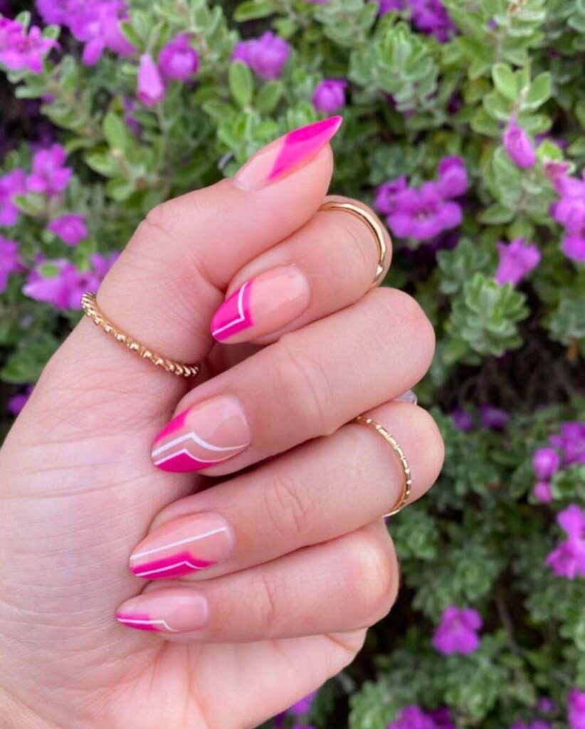 Various pink nail designs including bright pink nail designs, cute pink nail designs, and Christmas nails in pink with intricate patterns and decorations.