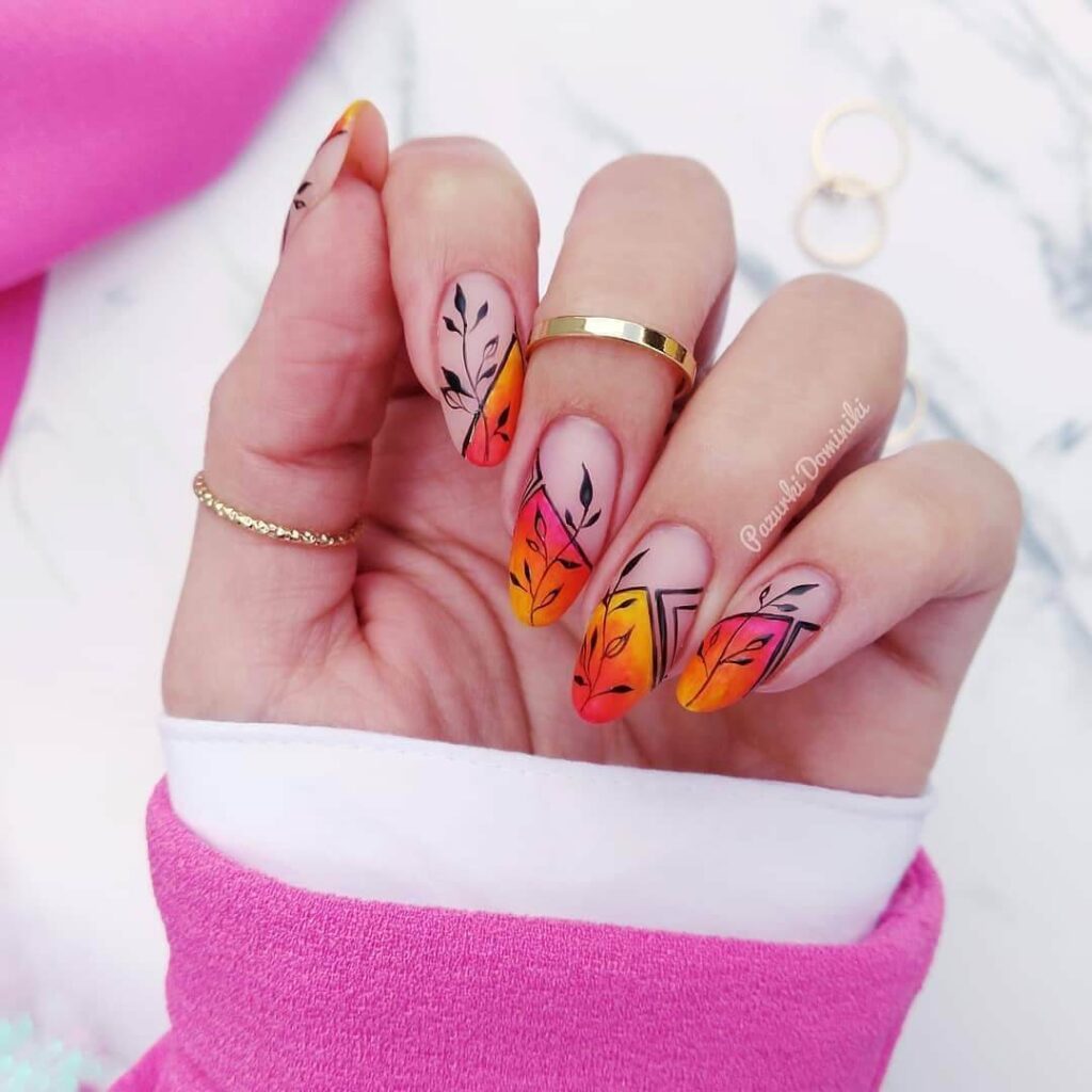 Bright and playful summer nail art with vibrant shades of blue, pink, and yellow, featuring beach-inspired designs and floral patterns.