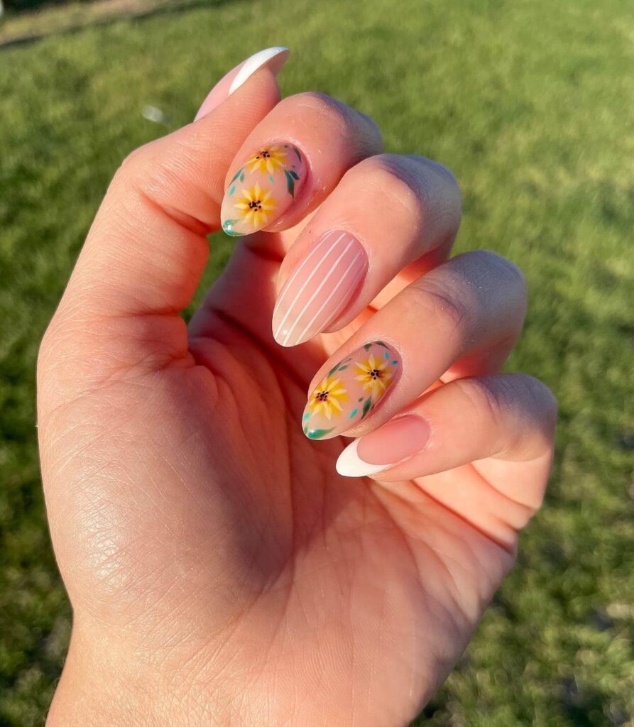 Elegant sunflower nails with intricate designs on both gel and matte finishes, perfect for any season.