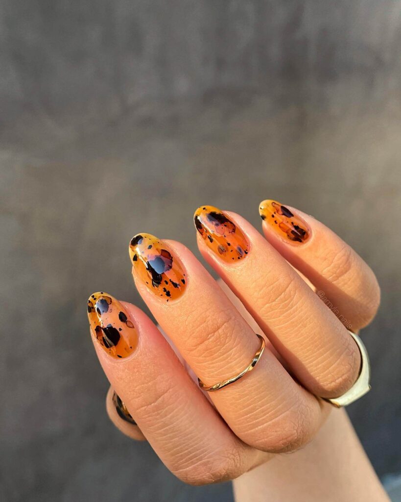 Explore the world of amber nails with creative amber nail art ideas, from amber gel nails to amber acrylic nails and more. Get inspired for your next manicure.