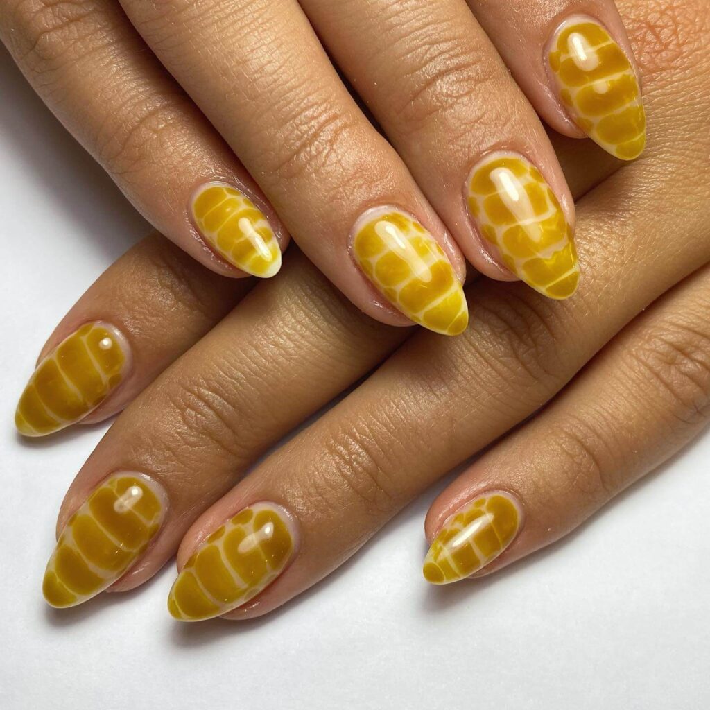 Explore the world of amber nails with creative amber nail art ideas, from amber gel nails to amber acrylic nails and more. Get inspired for your next manicure.