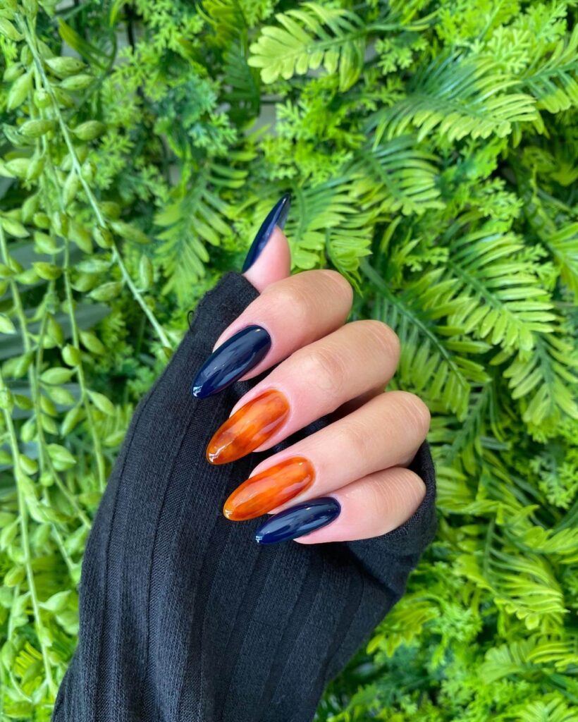 Explore the world of amber nails with creative amber nail art ideas, from amber gel nails to amber acrylic nails and more. Get inspired for your next manicure.