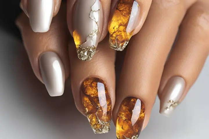 Explore the world of amber nails with creative amber nail art ideas, from amber gel nails to amber acrylic nails and more. Get inspired for your next manicure.