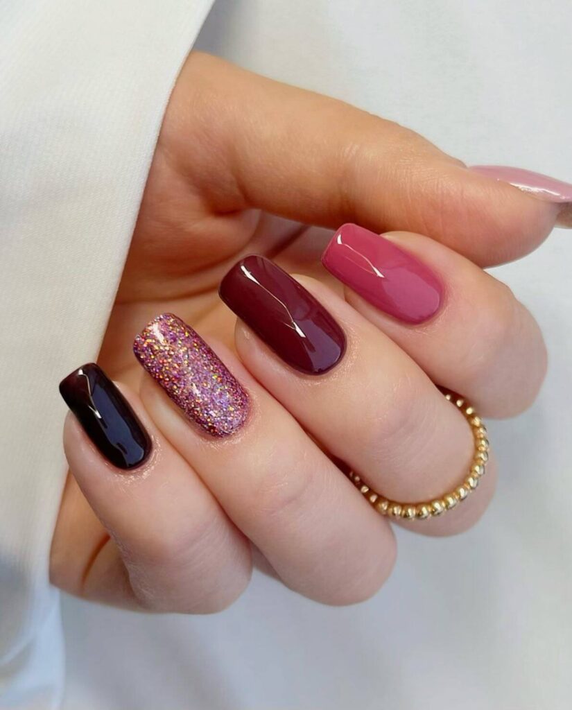 A variety of gradient nails designs including fall gradient nails, black to red gradient nails, and blue glitter fade nails.