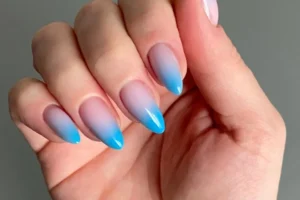 A variety of gradient nails designs including fall gradient nails, black to red gradient nails, and blue glitter fade nails.