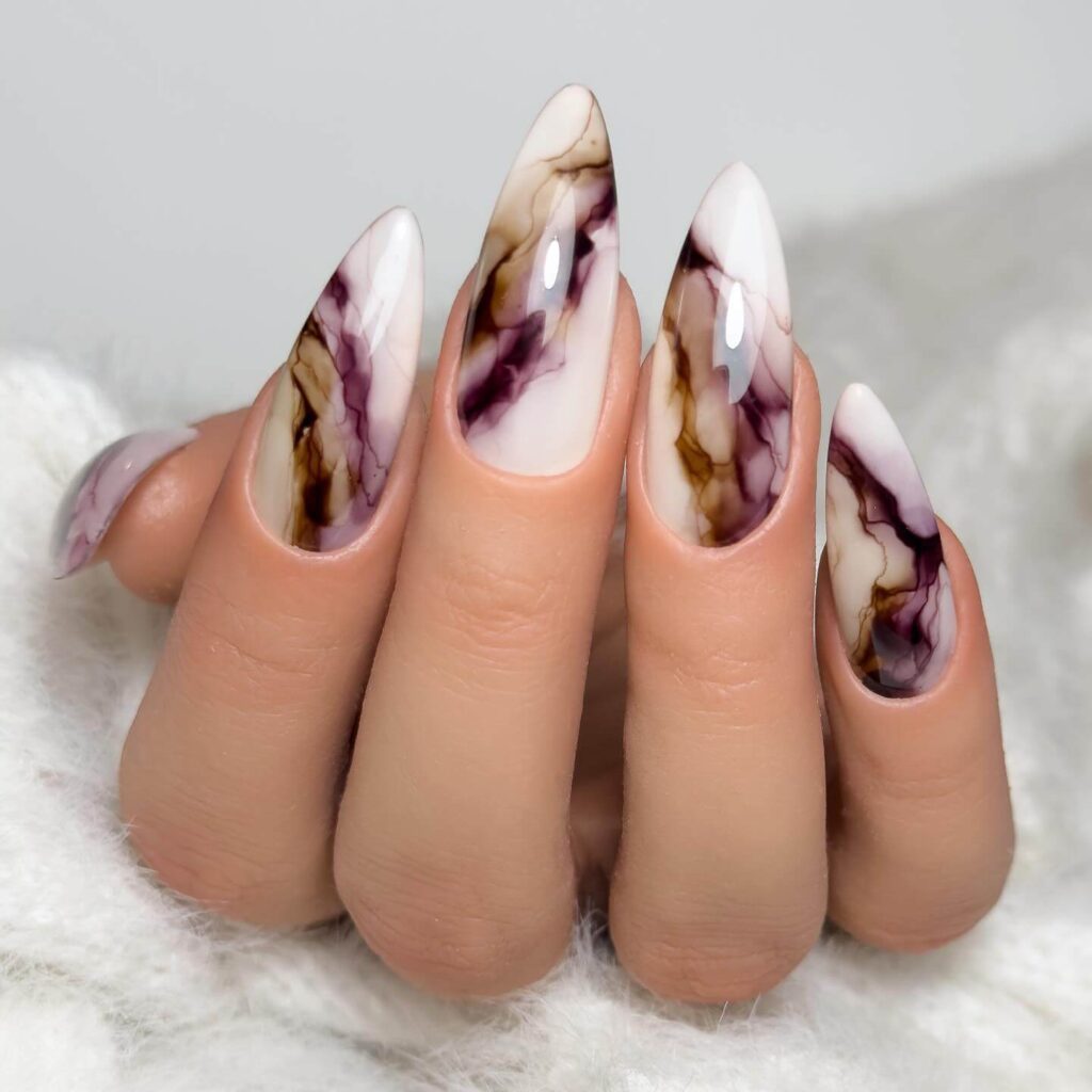 Explore the latest fall nail art trends with beautiful autumn nails and fall nail designs. Discover the best fall nail colors and popular nail colors for fall.