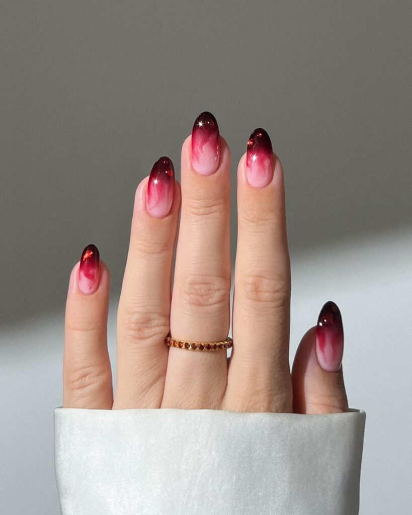 dark nails featuring burgundy, black ombre, and fall nail designs.