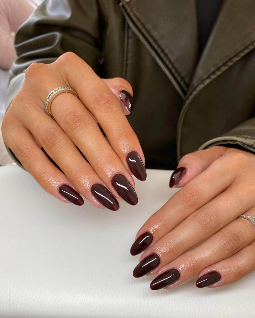 dark nails featuring burgundy, black ombre, and fall nail designs.