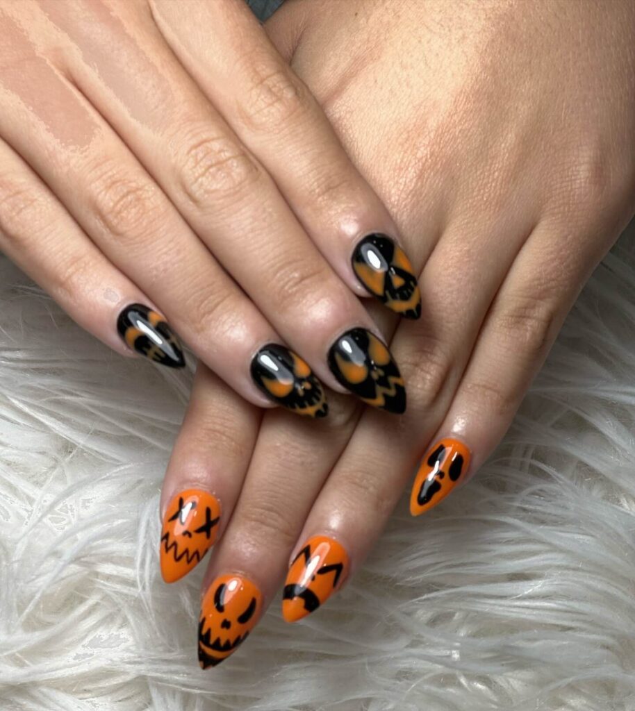 Stylish dark orange nails featuring chic fall designs perfect for autumn vibes.