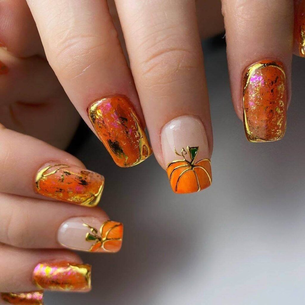 Stylish dark orange nails featuring chic fall designs perfect for autumn vibes.