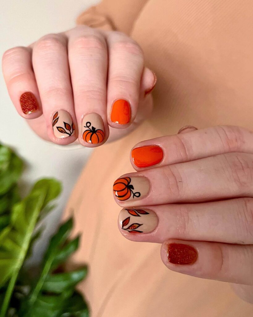 Stylish dark orange nails featuring chic fall designs perfect for autumn vibes.