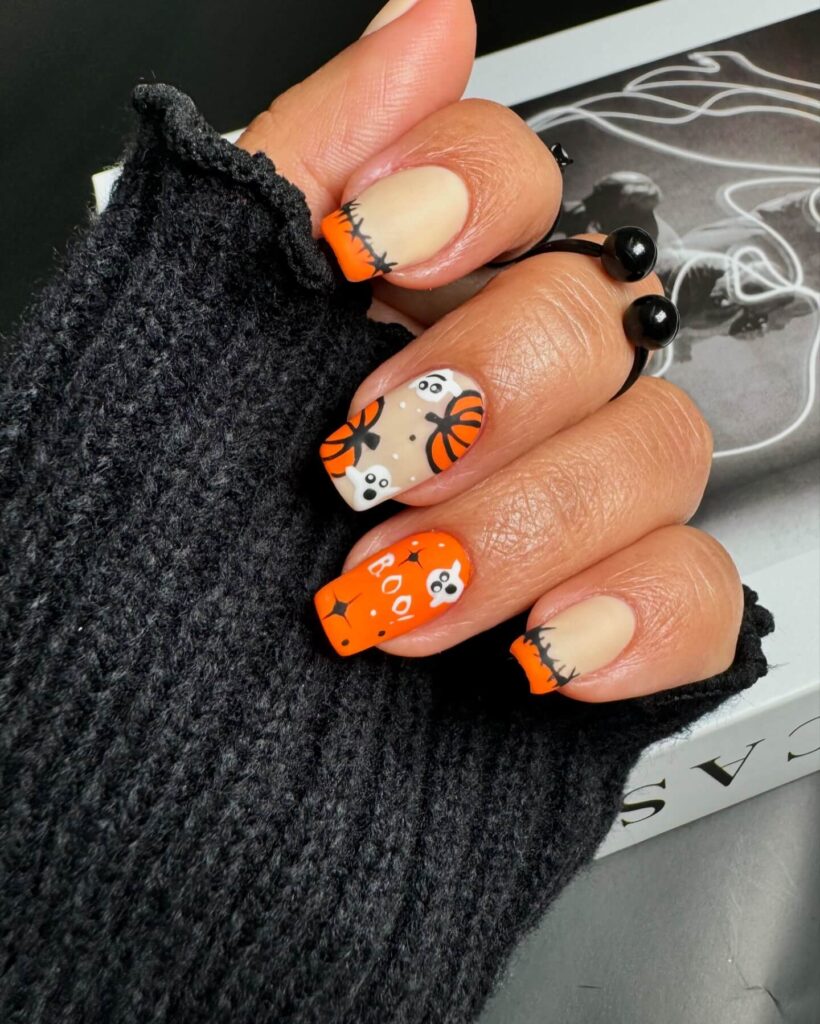 Stylish dark orange nails featuring chic fall designs perfect for autumn vibes.