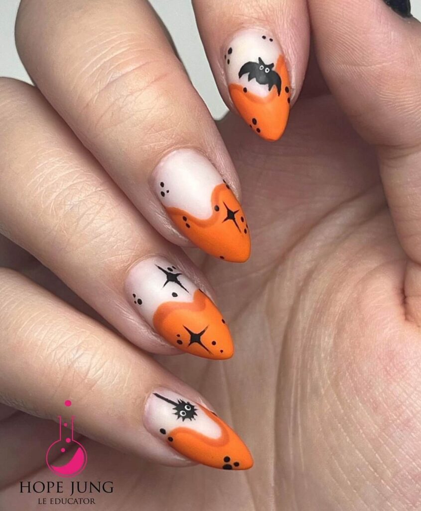 Stylish dark orange nails featuring chic fall designs perfect for autumn vibes.