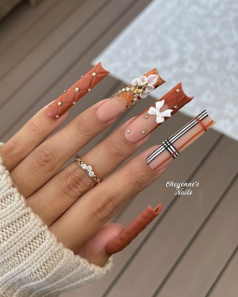 Chic fall french tip nails featuring warm, autumn-inspired colors with elegant, minimalist designs.