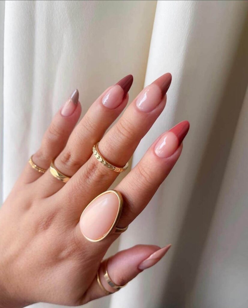 Chic fall french tip nails featuring warm, autumn-inspired colors with elegant, minimalist designs.