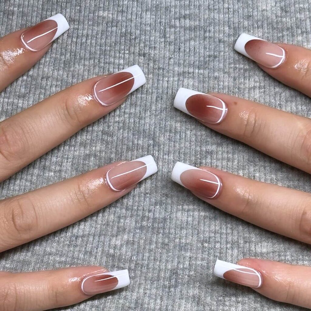 Chic fall french tip nails featuring warm, autumn-inspired colors with elegant, minimalist designs.