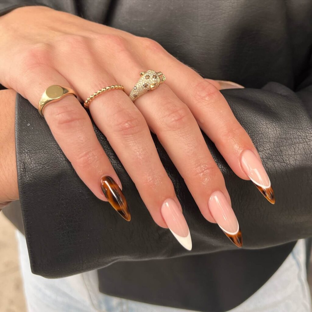 Chic fall french tip nails featuring warm, autumn-inspired colors with elegant, minimalist designs.