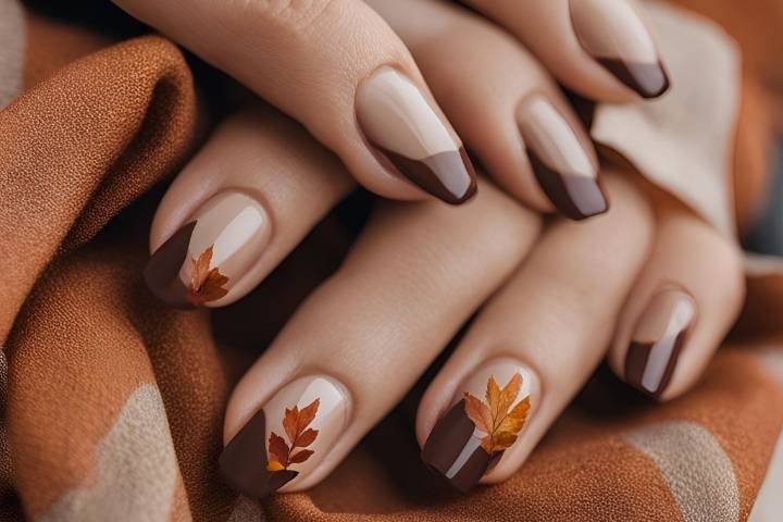 Chic fall french tip nails featuring warm, autumn-inspired colors with elegant, minimalist designs.