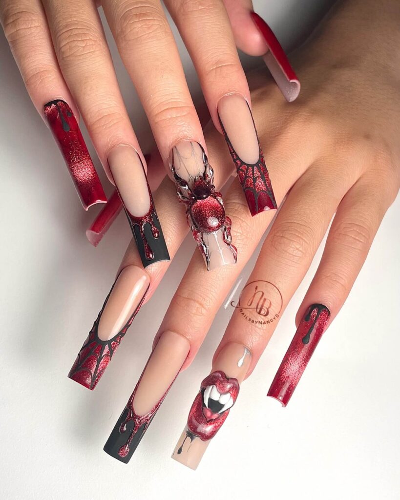 A set of Halloween acrylic nails with spooky nail designs, including black and red accents, ghosts, and candy corn-themed nails.