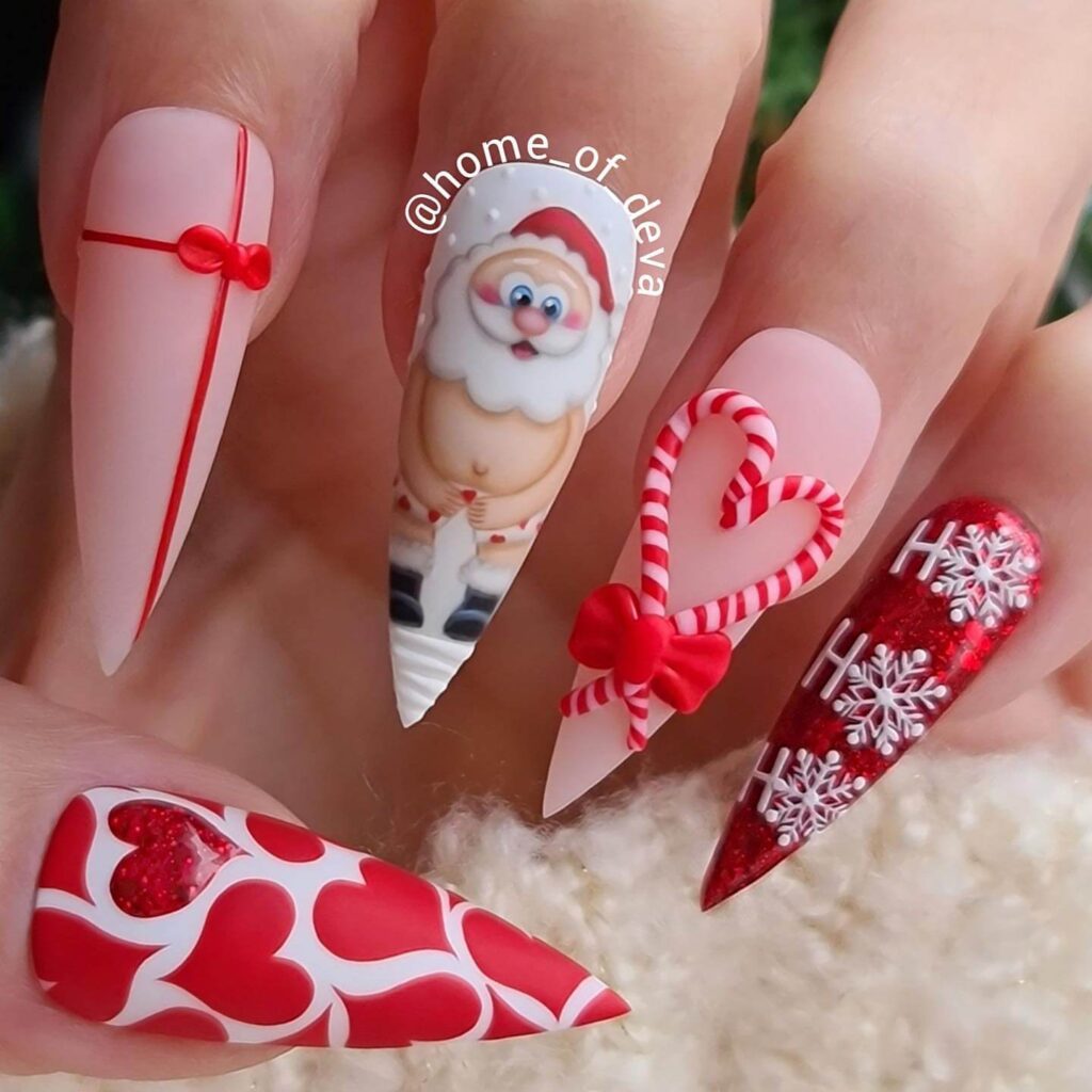 candy cane nails with red and white stripes and glitter accents, perfect for a festive holiday look.