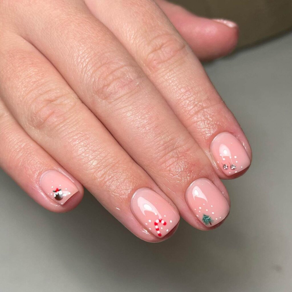 Festive Christmas gel nails featuring red, green, and white designs, including snowflakes, candy cane stripes, and Christmas tree accents.