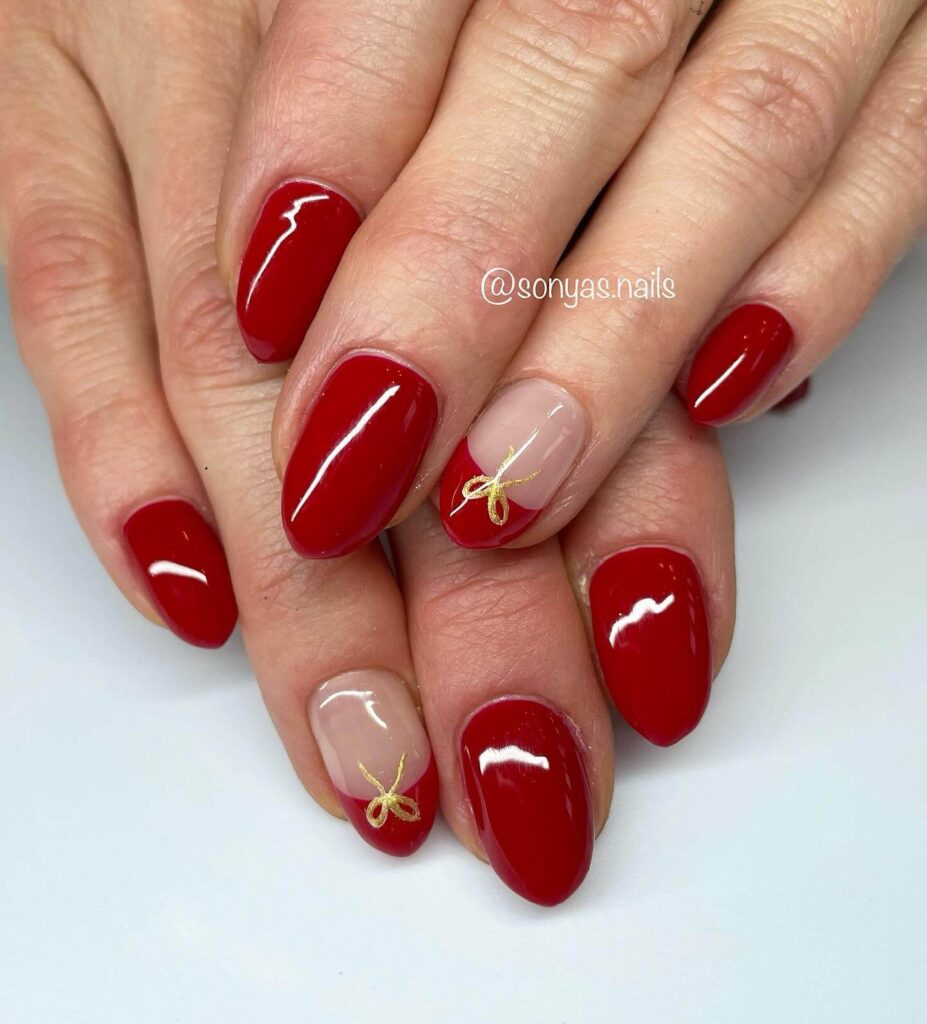 Festive Christmas gel nails featuring red, green, and white designs, including snowflakes, candy cane stripes, and Christmas tree accents.